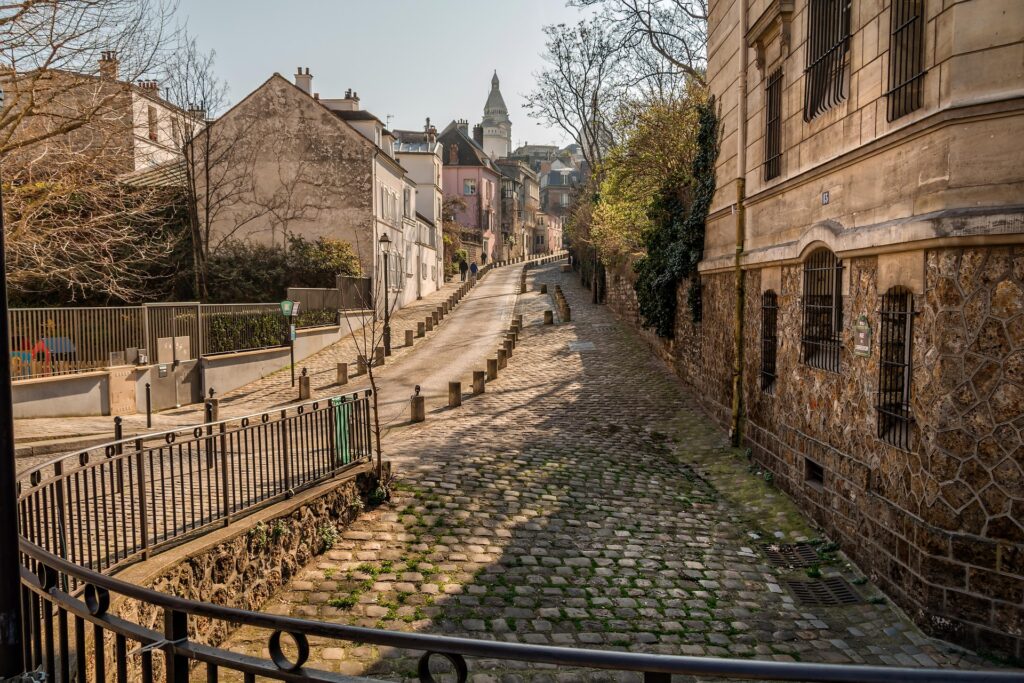 Rue de l'Abreuvoir, located in the Montmartre discrict off Paris.
A photo of the iconic street wich cobblestone paving